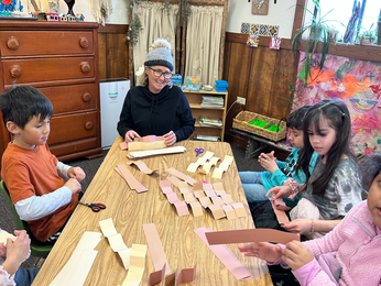 Kids work on a crafting project after school.