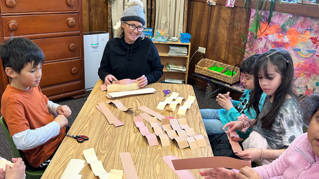 Kids work on a crafting project afterschool.