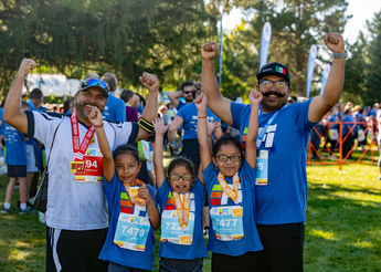 Group of people wearing colorful race gear