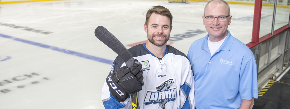Ice hockey players on big professional ice arena