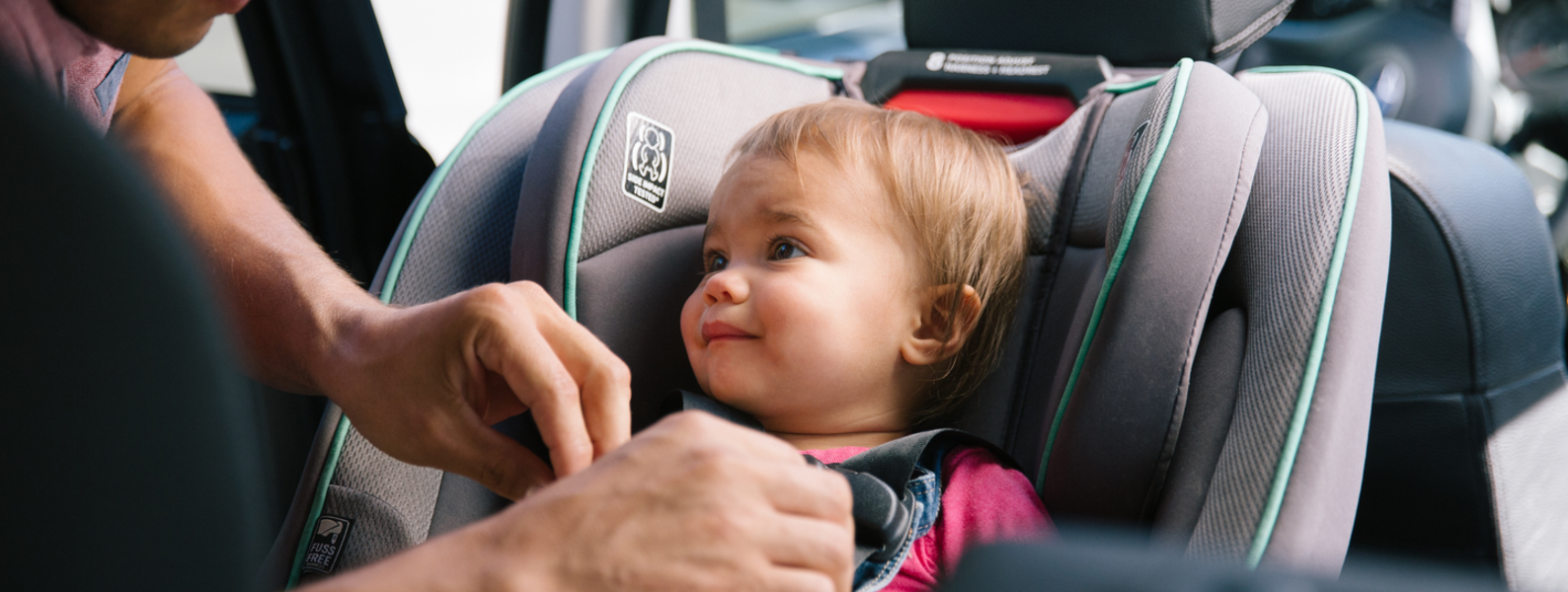 A little girl in her carseat