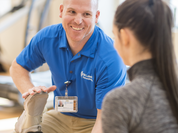 Young pharmacy resident at work.