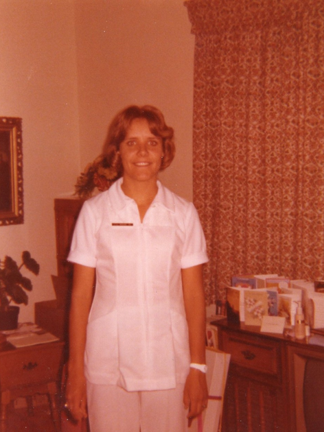  Young woman in nurse uniform