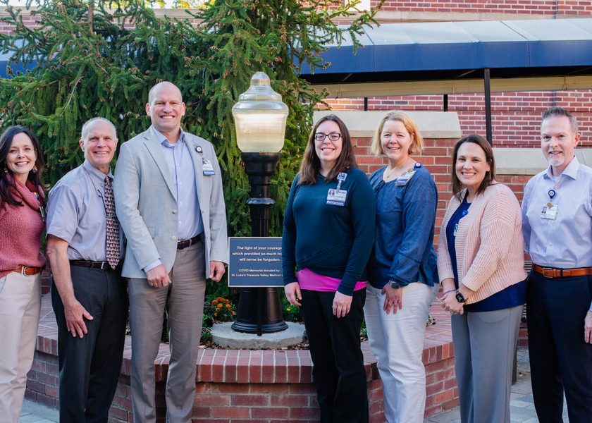 St. Luke's team members gather at the unveiling of the Boise COVID-19 memorial.