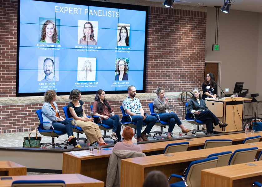Expert panelists on stage.