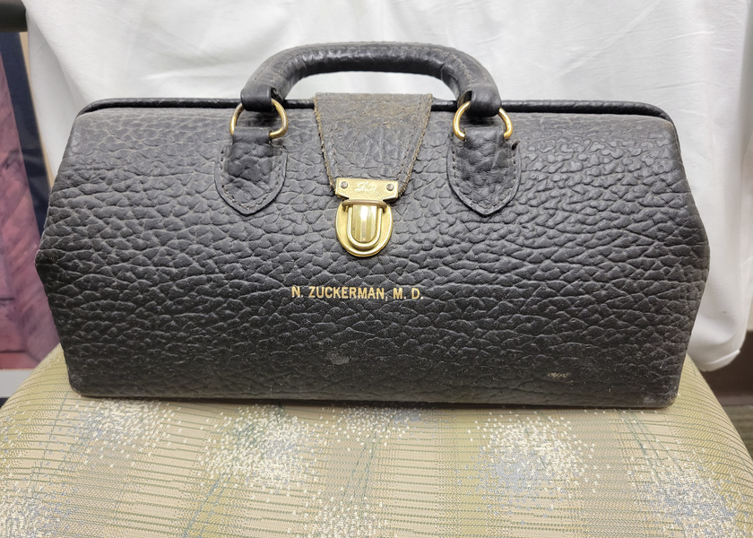 Old school leather doctor’s bag. 