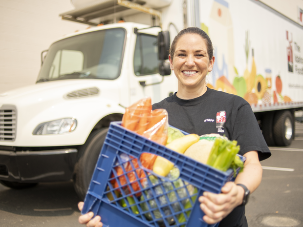 Volunteer smiling while working
