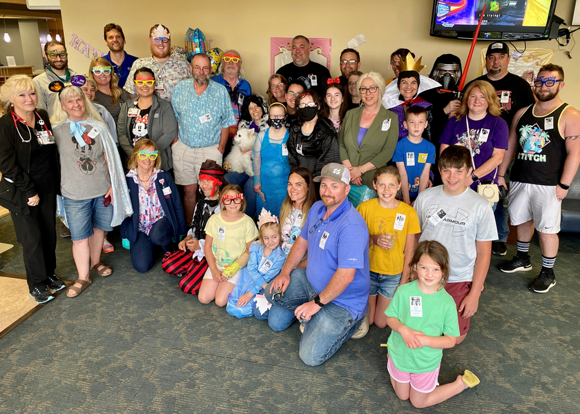  Large group of people smiling at camera