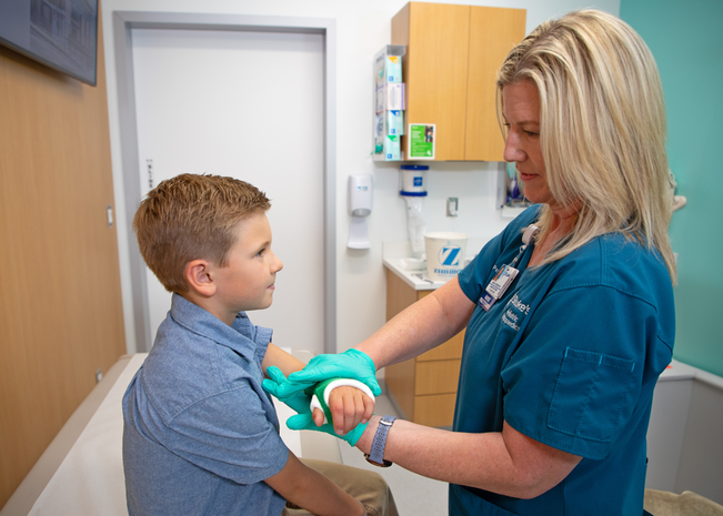 Boy gets walk-in help from provider.