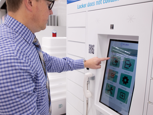 Man at medication locker