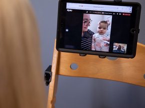 Telehealth screen with child and mother