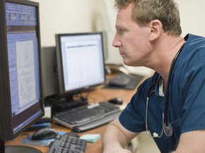 physician reviewing patient information