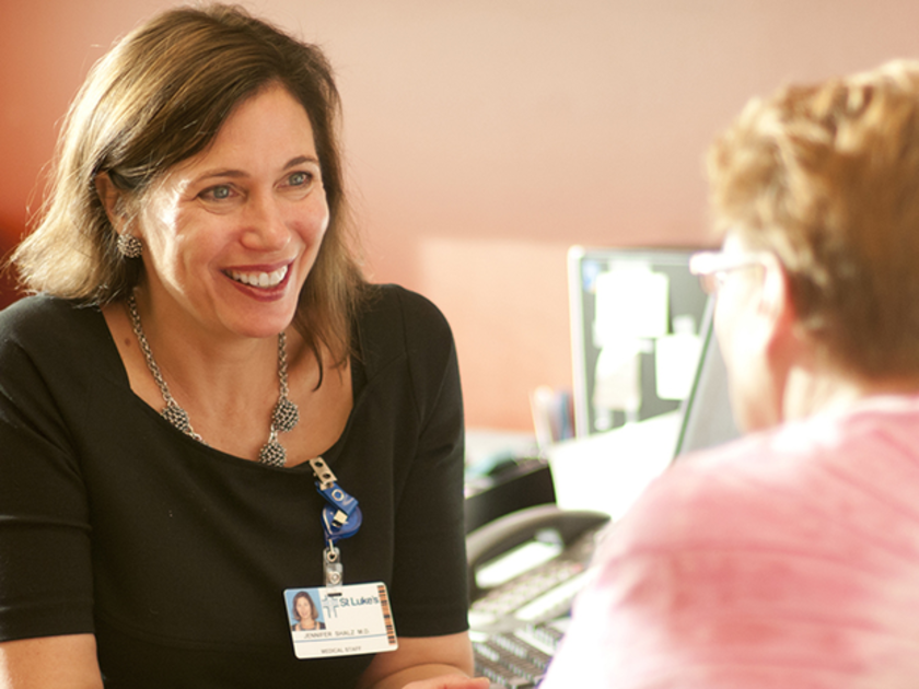 Doctor pleasantly engages with patient