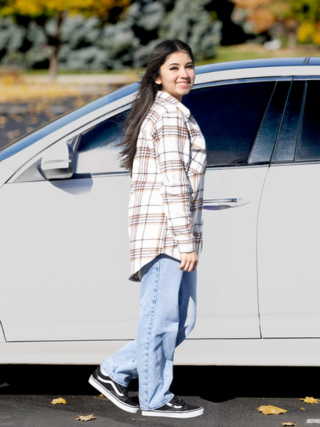 Photo of Ana with her car
