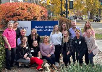 A recent photo of 15 Cystic Fibrosis Center of Idaho team members at the Boise clinic, including Dr. Perry Brown, second from right in the back row.