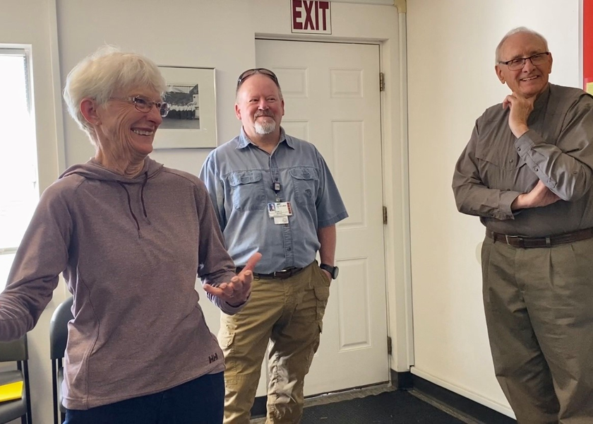 Three people enjoying themselves