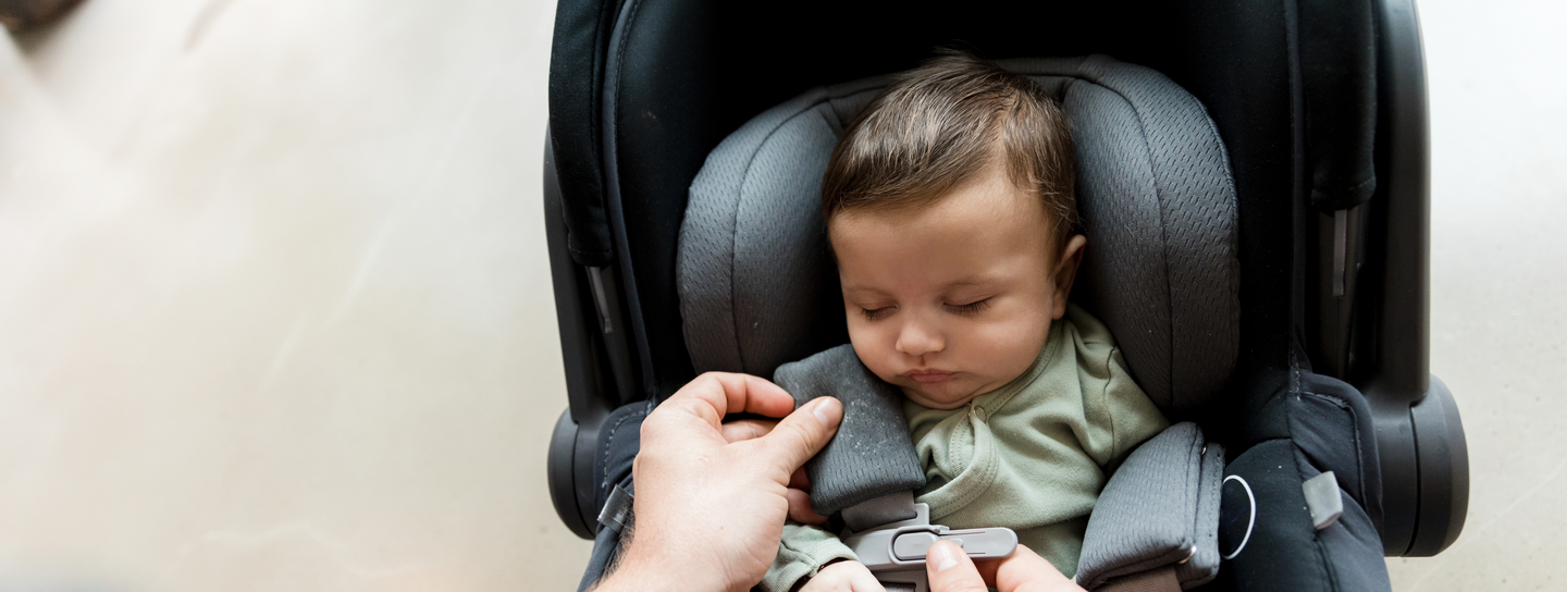 Child sleeping in a car seat