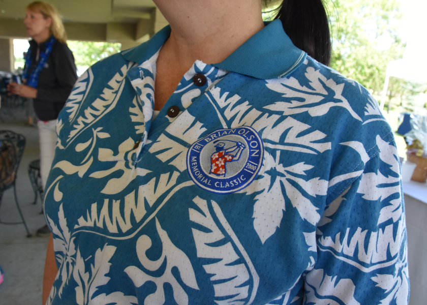 Participant wearing bright, Hawaiian-style shirt