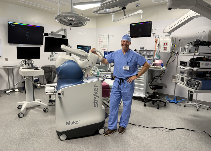 Dr. Haslam and Mako, a robotic arm for assisted surgeries 
