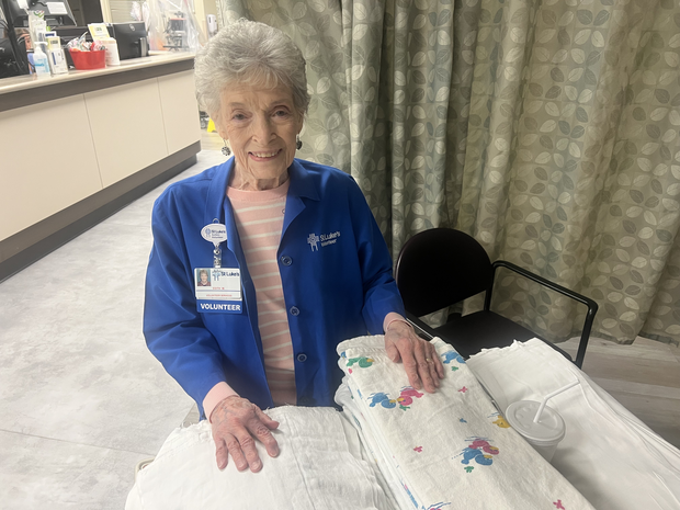 Bringing 'love and light,' St. Luke's NICU volunteer celebrates 95th birthday with team