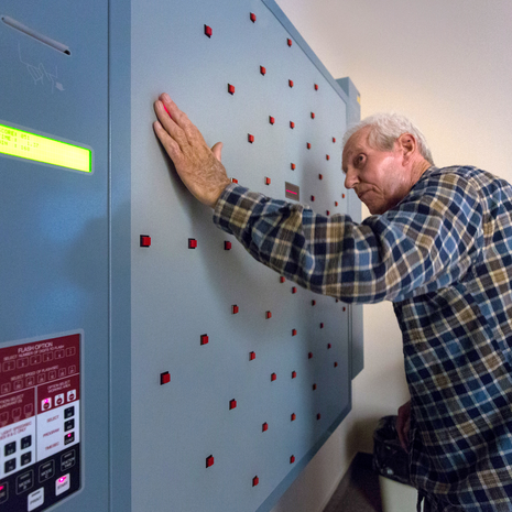 Senior man working through his neurologic rehabilitation therapy