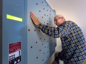 Patient using light wall in therapy gym