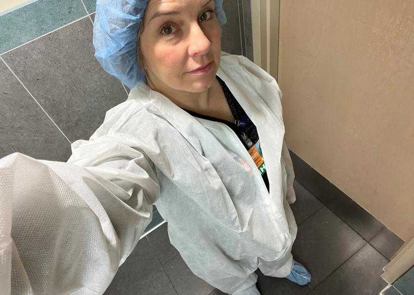 Selfie of a woman in hospital gear