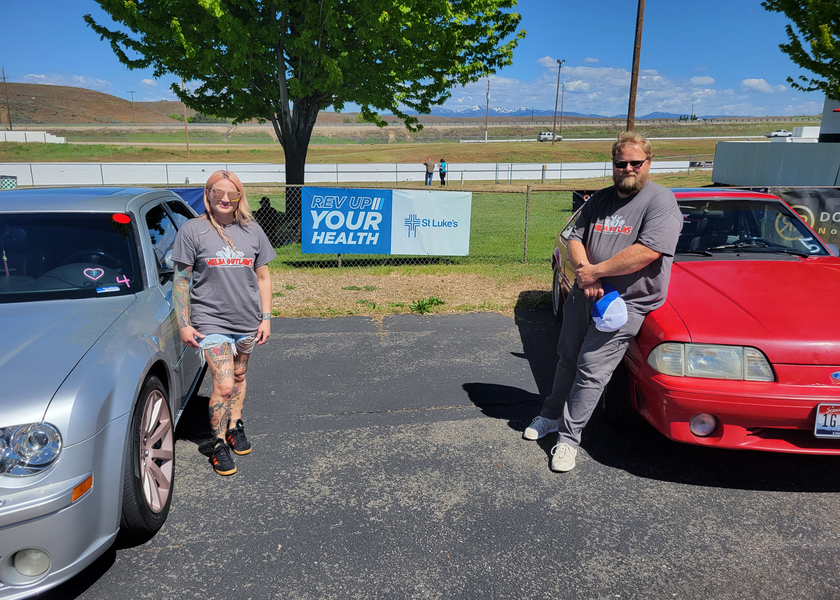 Posing with their cars at Firebird Raceway