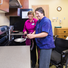 Patient at stove in transitional apartment at Gwen Neilsen Anderson Rehabilitation Center