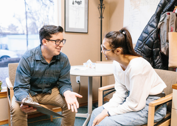 Two people in conversation