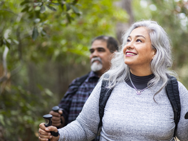 mature woman and man hiking