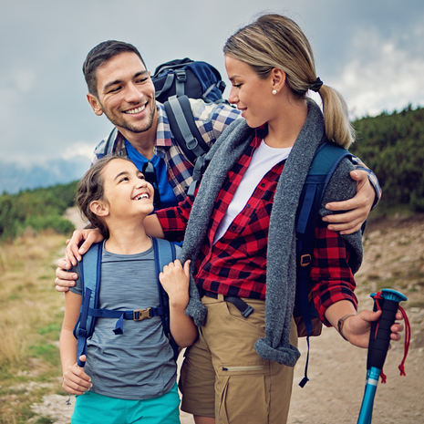 family hiking in the mountains