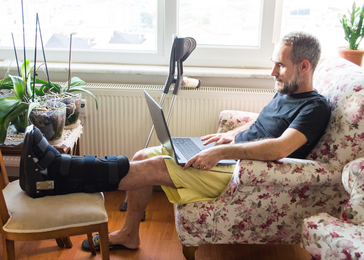 Man recovering from injury to lower leg