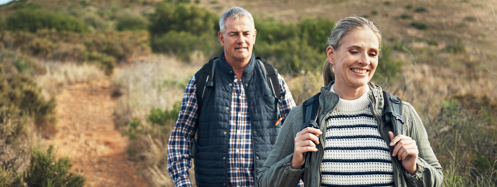 Mature couple hiking in the foothills