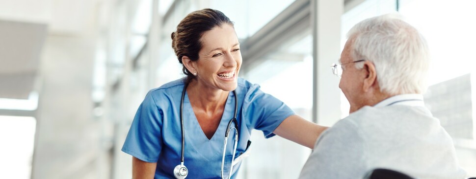 Friendly nurse greets a patient