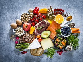 Variety of food spread out on counter