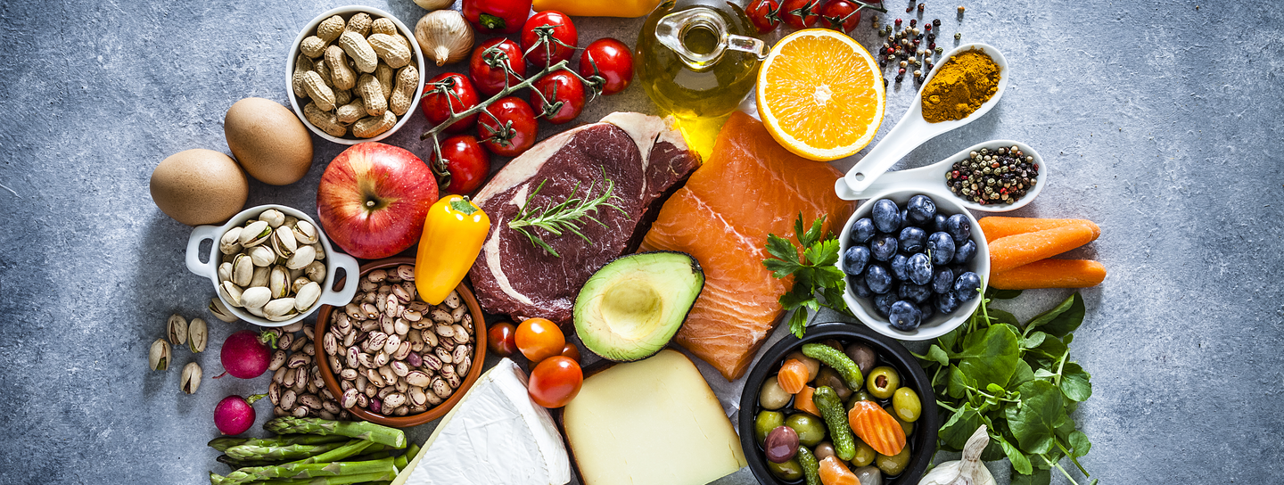 table filled with large variety of food