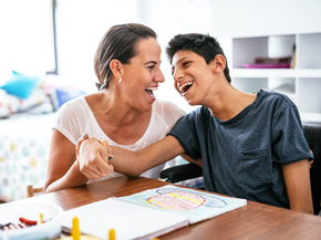Disabled teenager working on motor skills