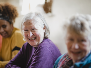 Support group discusses topics in a circle.