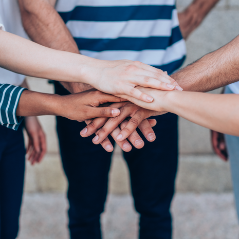 all hands in for teamwork