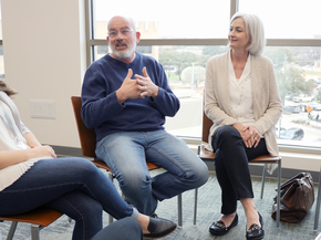 Mature man speaks to a support group