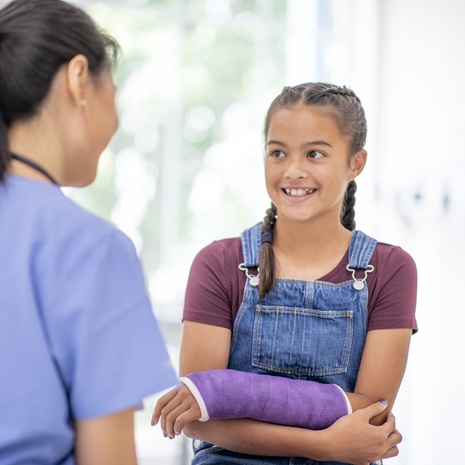Young girl goes to a medical check up for her broken bone.