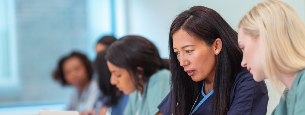 Multi-ethnic group of nursing students in class 
