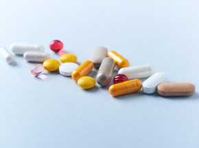 A variety of vitamins spread out on table