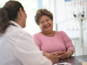 woman speaking to doctor