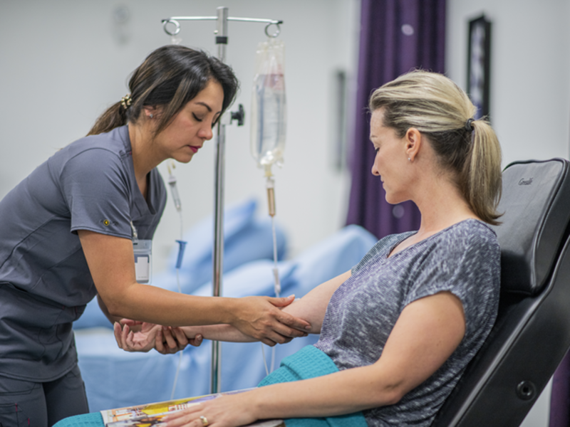 Provider connect infusion bag to chemotherapy patient