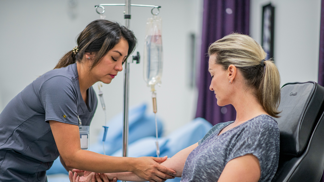 Provider connect infusion bag to chemotherapy patient