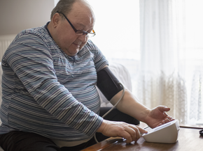 man taking his blood pressure