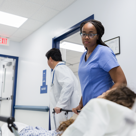 Pharmacist using a tablet to manage prescriptions