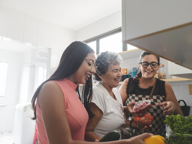 Hispanic woman is supported by her friend.